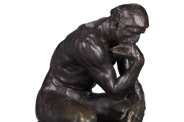 An extraterrestrial version of the Thinker Statue