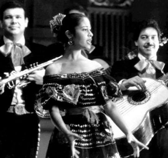 Film debut as a mariachi singer